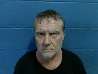 Bond denied for man charged with murder after body found at auto shop